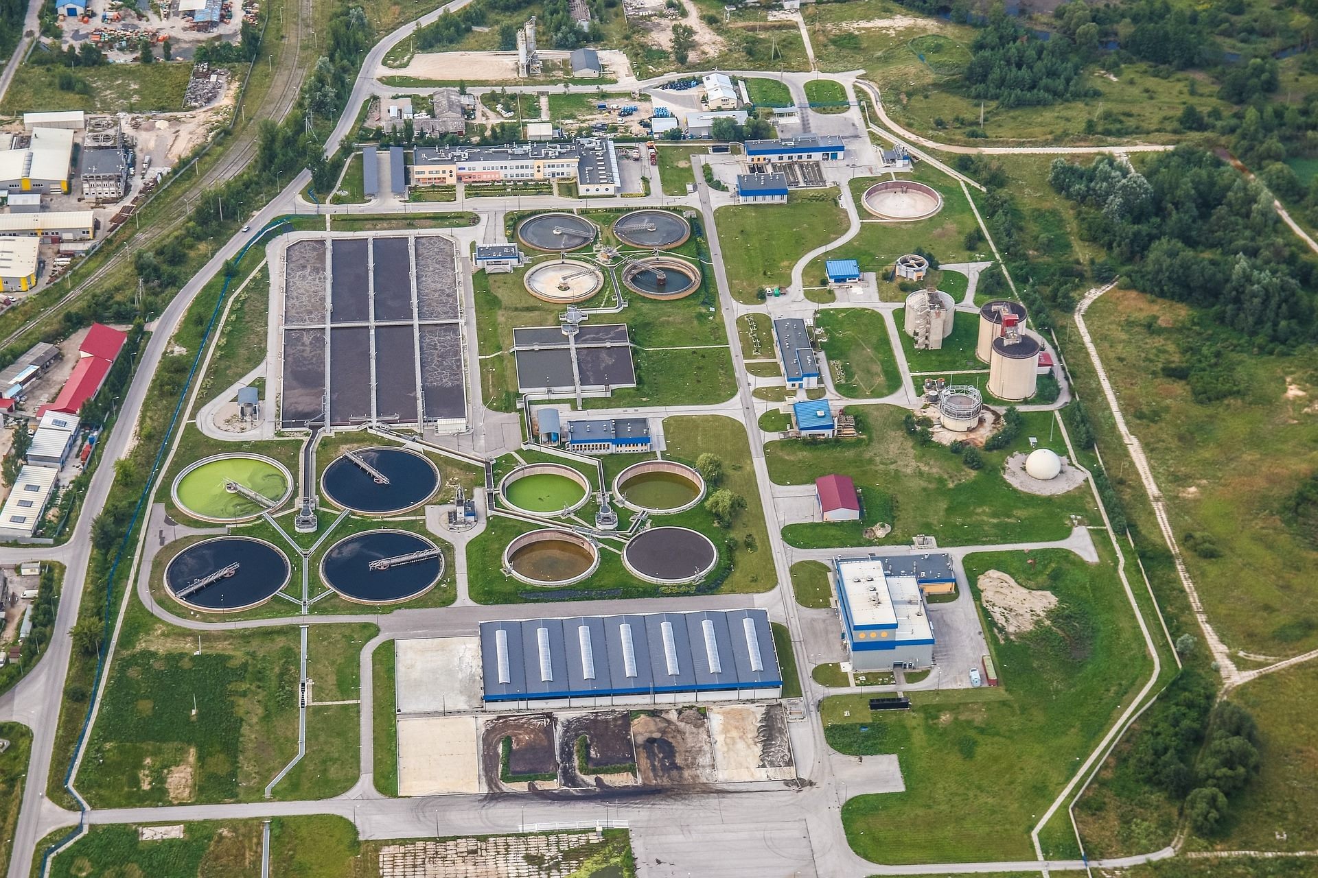 Aerial view of wastewater treatment basins and plant infrastructure